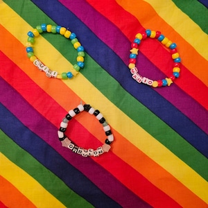 Cute Fun Colorful Movie Video Game Character Handmade Kandi Pony Bead Stretchy Bracelets - Super Mario Bros Mario Luigi Warioware Orbulon