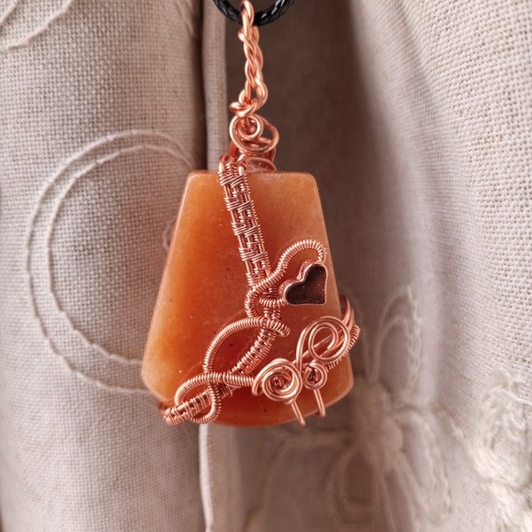 Red aventurine stone pendant hand wrapped in woven copper wire (supplied with cord necklace)