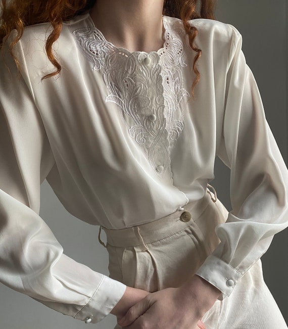 vintage white blouse with embroidered details