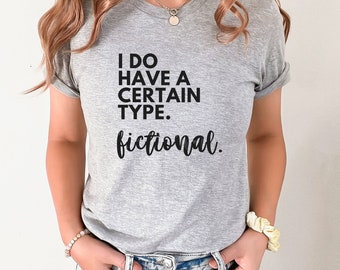 May include: Grey t-shirt with the text "I do have a certain type. fictional."