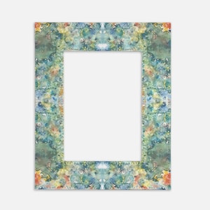 May include: A watercolor frame with a green, blue, and yellow abstract pattern. The frame has a white center for adding a photo or artwork.