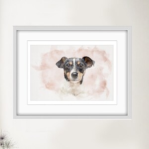 May include: A framed watercolor print of a dog's face, featuring black, white, and brown markings. The artwork is set against a soft pink watercolor background. The print is displayed in a white frame, adding a touch of elegance to the room.