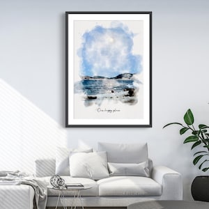 May include: A framed wall art print featuring a watercolor landscape of a blue sky, dark mountains, and a calm body of water. The artwork includes the text Our happy place in a black script font centered at the bottom of the white paper border.