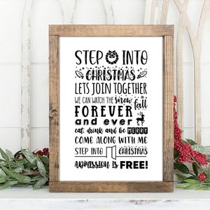 May include: A black and white sign with a rustic wood frame that reads "Step into Christmas, Let's join together, we can watch the snow fall forever and ever, eat, drink and be merry, come along with me, step into Christmas, admission is free!"
