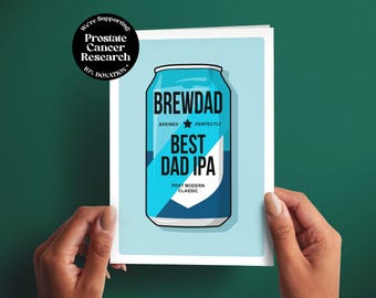 May include: A greeting card featuring a light blue beer can illustration with the text BREWDAD, BEST DAD IPA, BREWED PERFECTLY, and POST MODERN CLASSIC. A circular black badge in the corner reads We're Supporting: Prostate Cancer Research 10% DONATION.