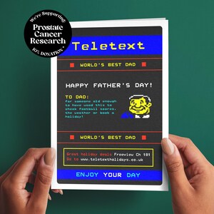 May include: A greeting card featuring a retro Teletext screen design with blue and black sections. Text includes Teletext, World's Best Dad, Happy Father's Day, and a pixelated illustration of a person. A circular badge notes support for Prostate Cancer Research.