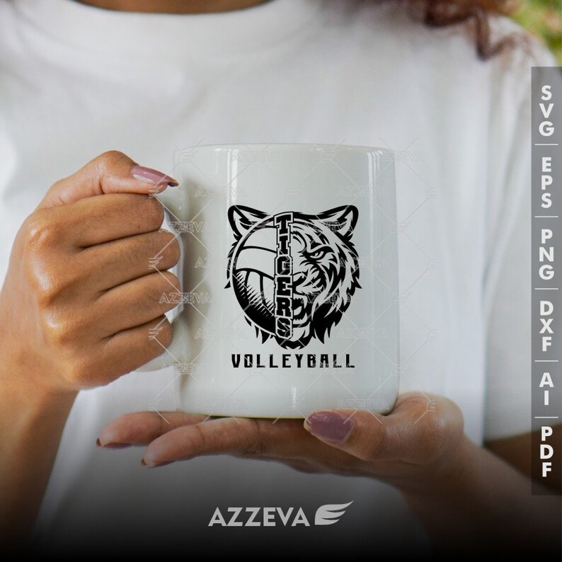 May include: White ceramic mug with a black and white graphic of a tiger's head with a volleyball inside. The text "TIGERS VOLLEYBALL" is printed below the graphic.