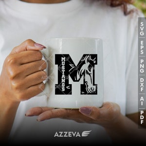 May include: White ceramic mug with a black graphic of a horse's head inside the letter "M" and the word "MUSTANGS" printed vertically beside it.
