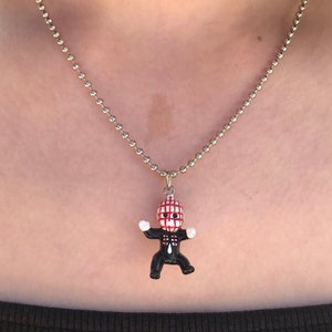 Baby Pinhead Hellraiser necklace