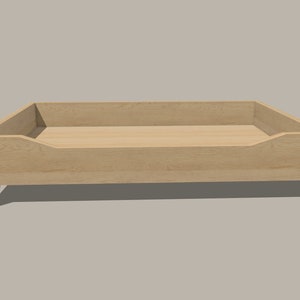 May include: A wooden dog bed with a raised rim and four legs. The bed is made of light brown wood and has a natural finish.