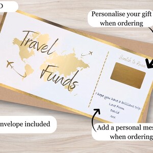 May include: A gold and white card with the words "Travel Funds" and a gold world map. The card has a scratch-off area with the words "Scratch to Reveal". The card is accompanied by a brown envelope. The text "Personalise your gift when ordering" and "Add a personal message when ordering" is included on the card.