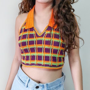 May include: A purple, green, and orange plaid crochet halter top.
