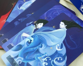 May include: Two figures in blue robes stand against a dark blue background with gold stars. The figures are surrounded by swirling blue waves and a dragon. The card reads "Spirit - Moon".