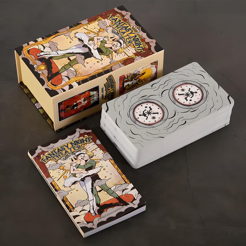 May include: A deck of cards and a box set with the words "Fantasy Night Theaters" on the box and card deck. The box and card deck feature illustrations of a couple dancing and a clock design. The box is beige with a colorful illustration.