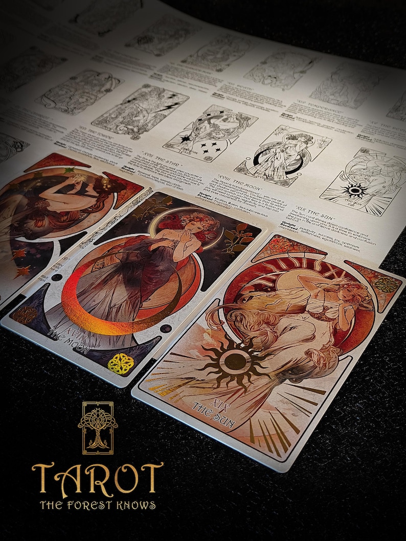 May include: Tarot card deck with art nouveau illustrations. The cards show figures with celestial elements, including the moon and sun. The deck includes the text "Tarot The Forest Knows".