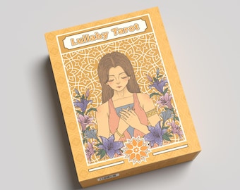May include: A tarot card box titled "Lullaby Tarot". The box has an illustration of a woman surrounded by flowers. The colour scheme is mainly yellow, with pink, blue, and purple accents. The box has a decorative banner with the title.