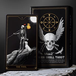 May include: A black tarot card with a skeleton illustration, a white dog, and the text "THE FOOL." The card is part of a "BORN SKULL TAROT" deck with a black box featuring a skull with wings and the text "MaxZ."