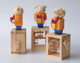 手作りの木製オートマタ「おいしいよ」