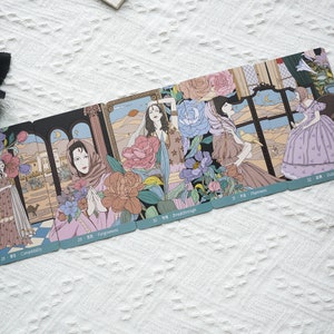 May include: A set of tarot cards with illustrations of women in various settings. The cards are numbered 28, 29, 30, 31, and 32. The card titles are Compatibility, Forgiveness, Breakthrough, Plainness, and Dust.