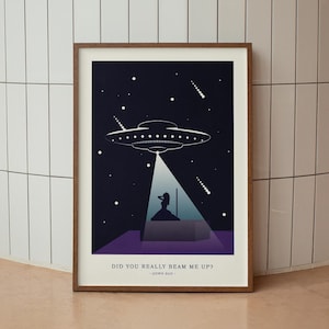 May include: A framed poster with a dark blue background and a silhouette of a woman standing in a spotlight. A flying saucer hovers above her, casting a beam of light down on her. The text "Did you really beam me up?" is printed below the image, with the words "Down Bad" in smaller font below that.
