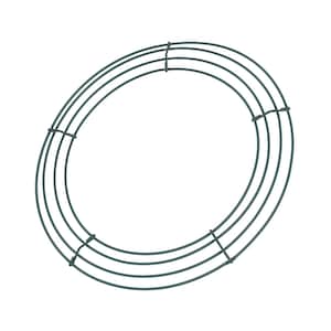 May include: A dark green metal wreath frame, oval in shape. The frame is made from several concentric wire rings, joined by vertical supports. Suitable for creating seasonal decorations.