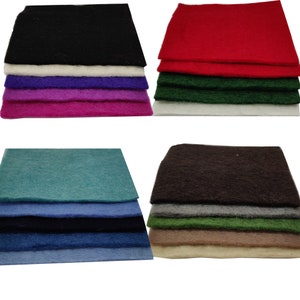 May include: A stack of 10 felt squares in various colours, including black, white, purple, pink, teal, blue, brown, green, beige, and cream.