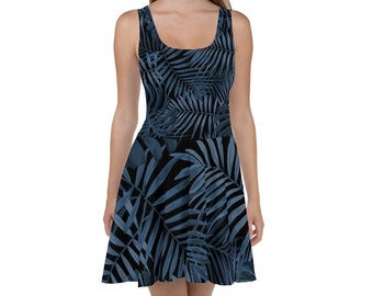 May include: A sleeveless skater dress with a dark blue and black tropical leaf print. The dress has a scoop neck and a fitted bodice.