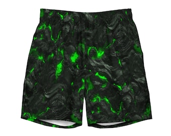 Puede incluir: Shorts negros y verdes con un diseño abstracto de remolinos.