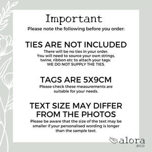 May include: A white background with text that reads "Important" and other details about the product. The text states that ties are not included, tags are 5x9cm, and text size may differ from photos. A floral design is in the upper left corner.