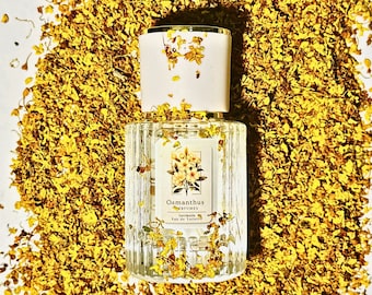 Perfume de osmanto artesanal para mujer: aroma floral a laurel, fragancia natural, vegana y sin crueldad animal.