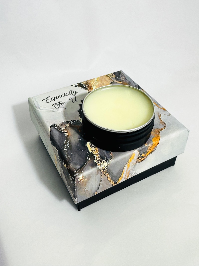 15g Medicinal Green solid perfume packaged in a marble-print gift box next to the open tin. A unique niche fragrance gift.