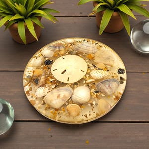 May include: A round, resin coaster with embedded seashells, sand, and a sand dollar. The coaster is a light, translucent color, with a variety of shells in different shapes and sizes. The coaster is a decorative item.