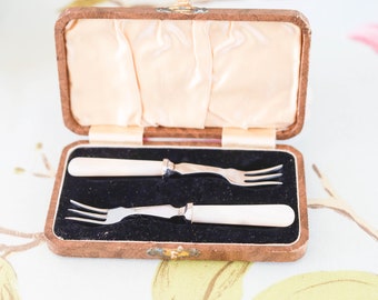Petite boxed set of Edwardian chrome-plated olive or pickle forks