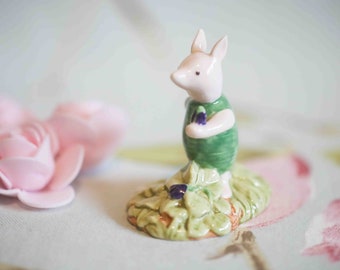 Royal Doulton Piglet picking violets