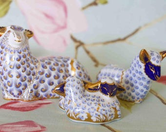 Royal Crown Derby ewe, twin and single lambs : 22 carat gold fine porcelain paperweights