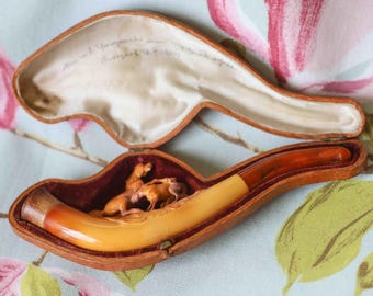 Exquisite 1922 Meerschaum pipe: intricately carved mare and foal, amber mouthpiece, fine velvet-lined case