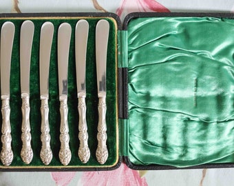 Ornate silver plated tea knives: Edwardian