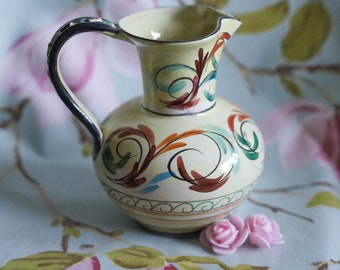 Delightful signed and hand-painted Glyn Colledge jug