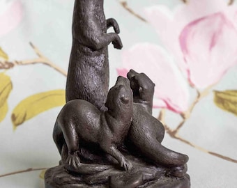 Alert otters: signed cold cast bronze tableau  17 x 11 cm