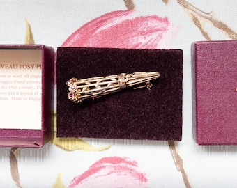 Beautiful Past Times posy holder brooch with amethyst coloured glass stones