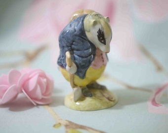 rare Beatrix Potter Tommy Brock (Royal Doulton Beswick) with spade handle facing out