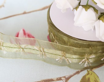 Sheer satin woven ribbon with gold feature: 38 mm