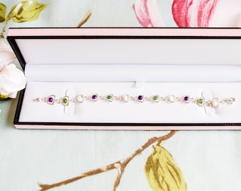 Suffragette colours: boxed sterling silver, dark amethyst, nephrite jade and freshwater pearl heart bracelet
