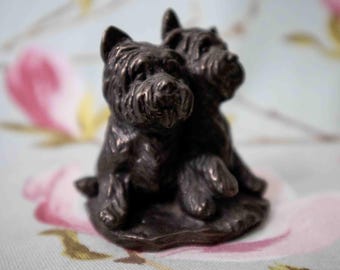 Two wickedly naughty Westies: cold cast bronze in fine condition