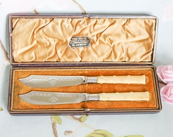 Boxed set of Edwardian butter knives: James Crichton Glasgow
