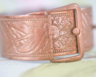 Art Nouveau style copper cuff bracelet fashioned as a buckle and belt