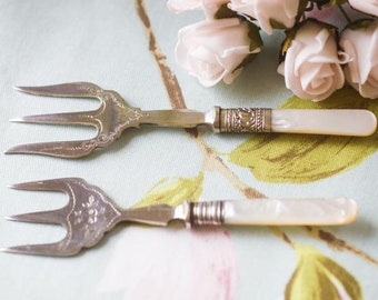 Two Victorian mother of pearl silver plated muffin or crumpet forks - perfect for autumn tea times