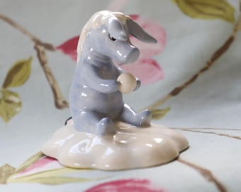 A snowy Eeyore from Royal Doulton's delightful Winnie the Pooh series: boxed