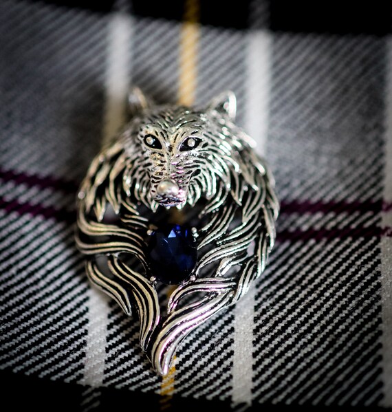 Stark brooch outlet