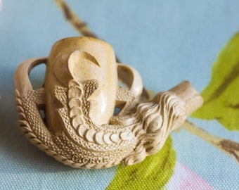 Wonderfully crafted mid Victorian C Crop (London) pipe bowl: bird of prey or dragon talon